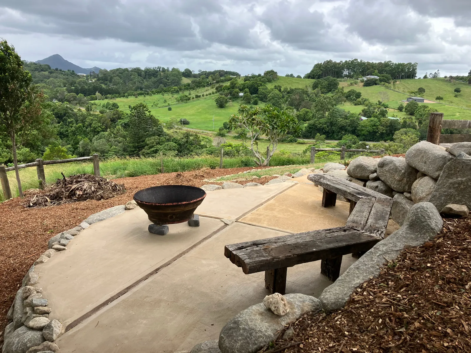 Acreage home with sculpted stone steps, native gardens and timber decking on the Sunshine Coast